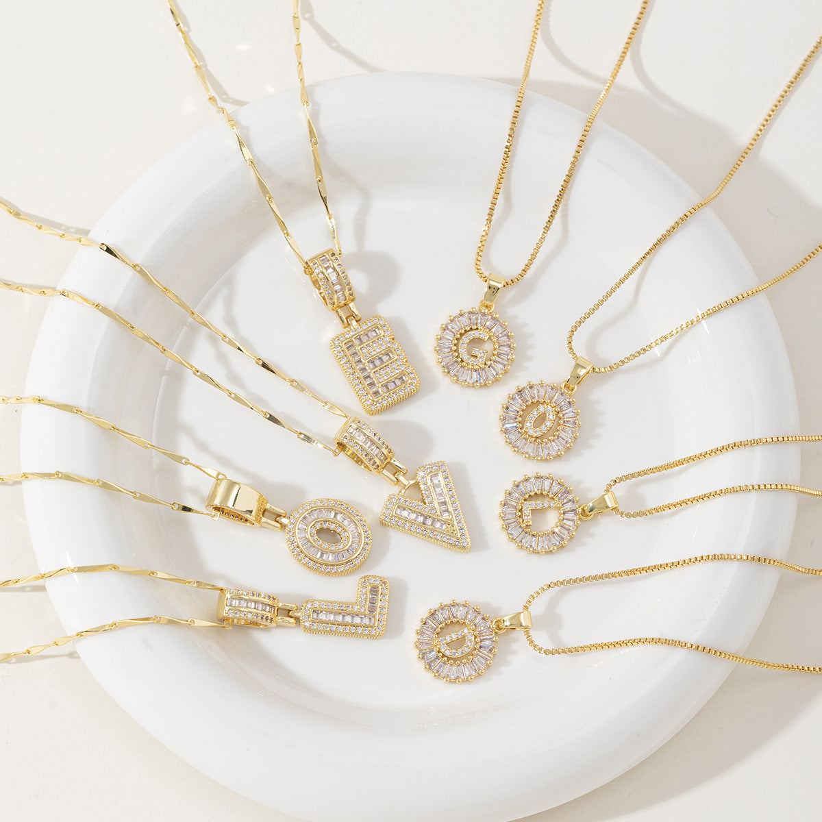 Rock Sugar Copper Inlaid Zircon Letter Pendant