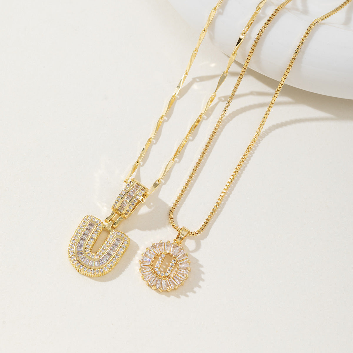 Rock Sugar Copper Inlaid Zircon Letter Pendant