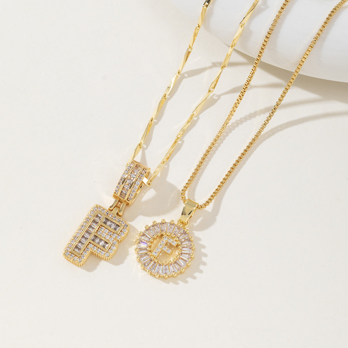 Rock Sugar Copper Inlaid Zircon Letter Pendant