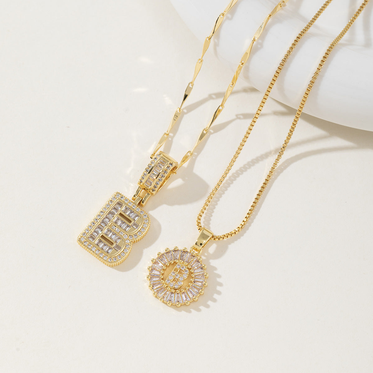 Rock Sugar Copper Inlaid Zircon Letter Pendant