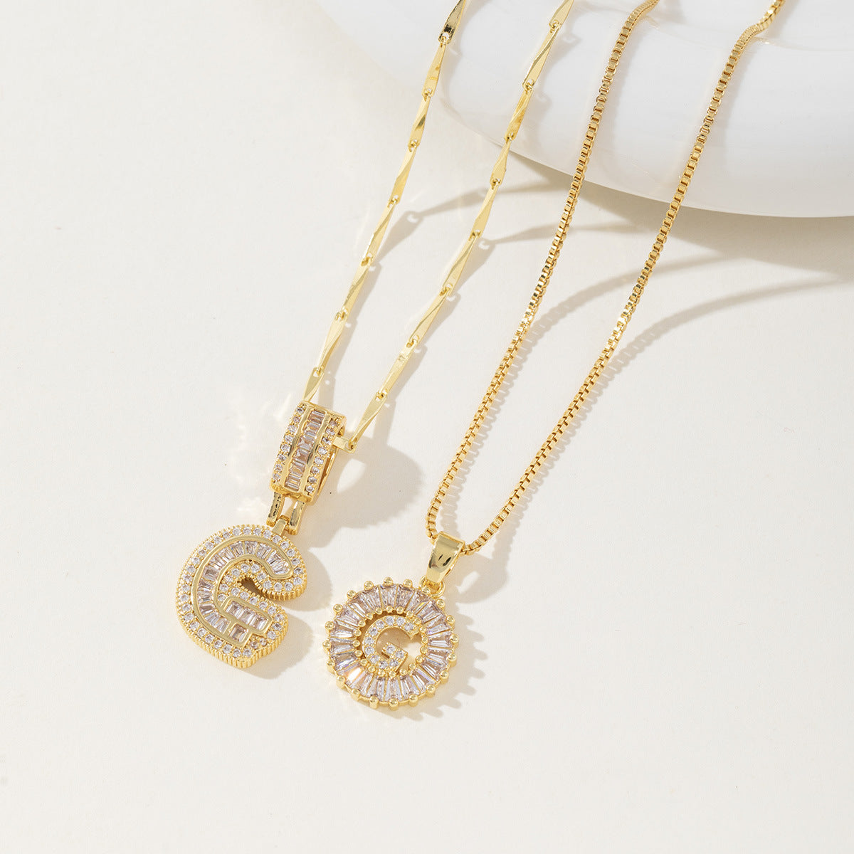 Rock Sugar Copper Inlaid Zircon Letter Pendant