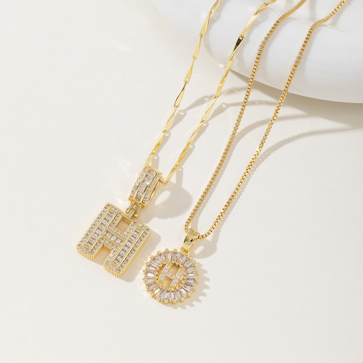 Rock Sugar Copper Inlaid Zircon Letter Pendant