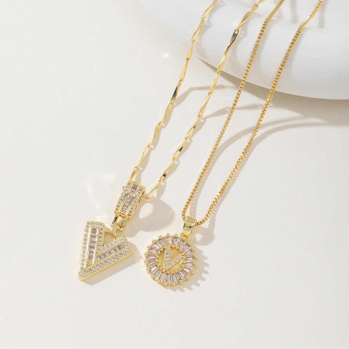 Rock Sugar Copper Inlaid Zircon Letter Pendant