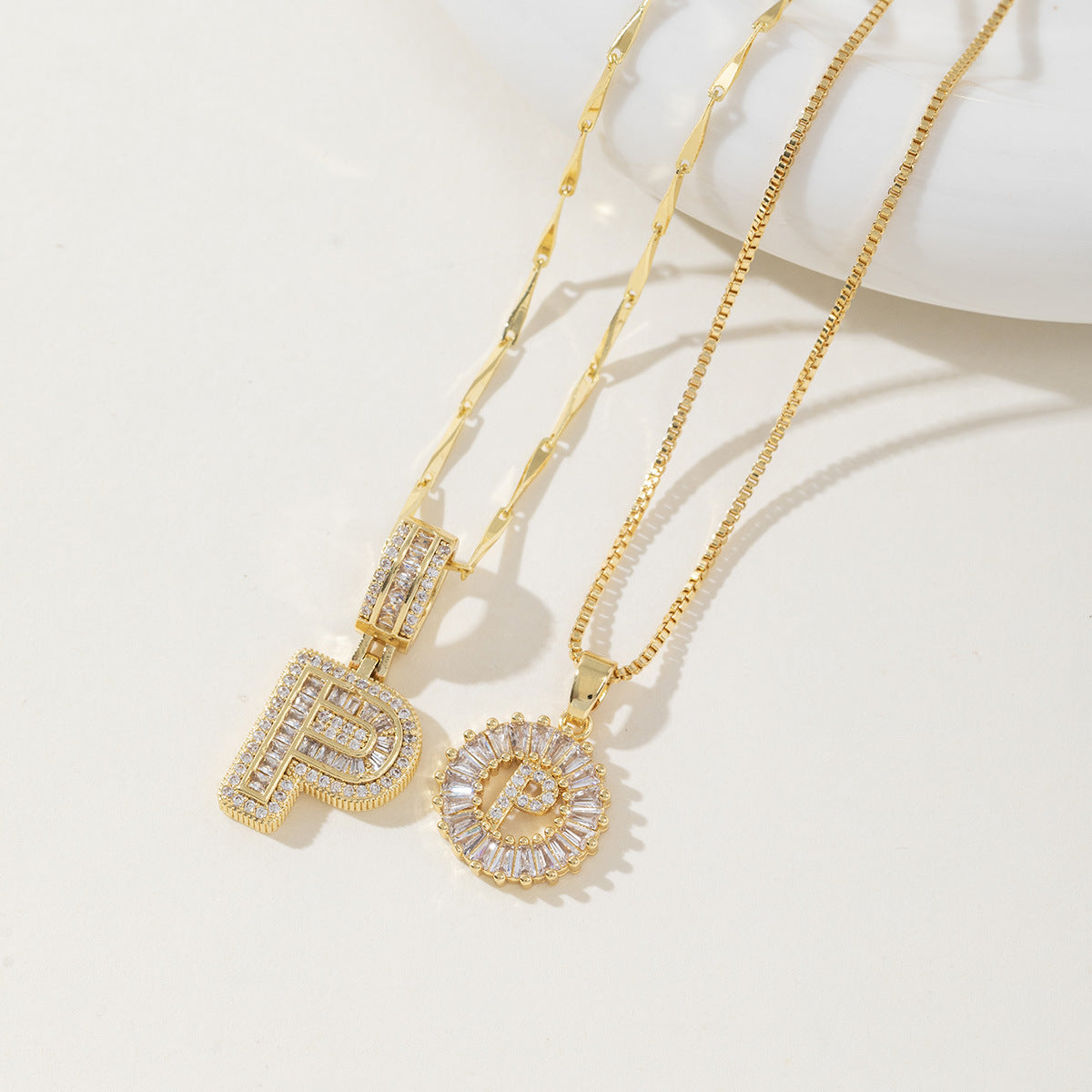 Rock Sugar Copper Inlaid Zircon Letter Pendant