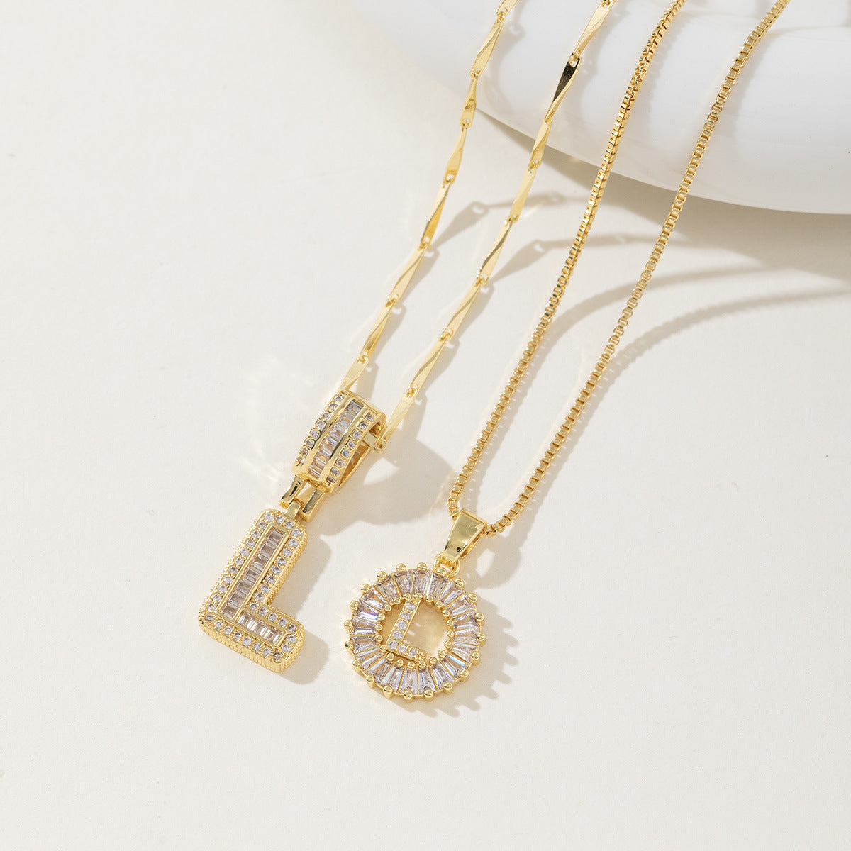 Rock Sugar Copper Inlaid Zircon Letter Pendant