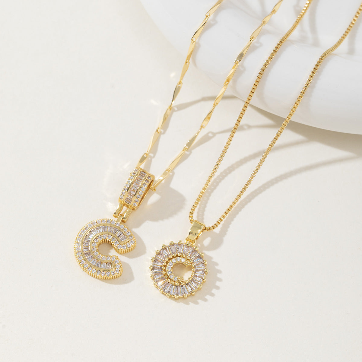 Rock Sugar Copper Inlaid Zircon Letter Pendant