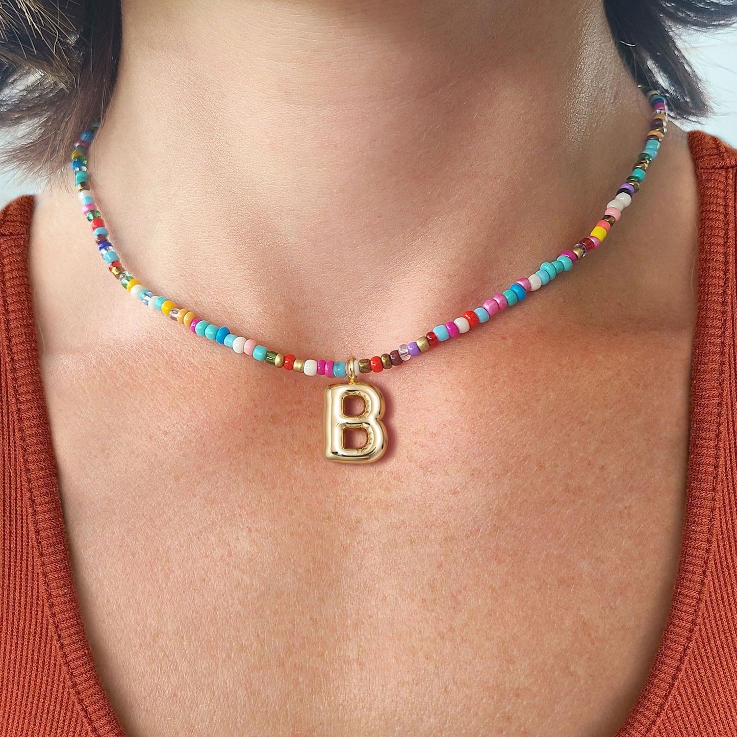 Colored rice bead letter pendant