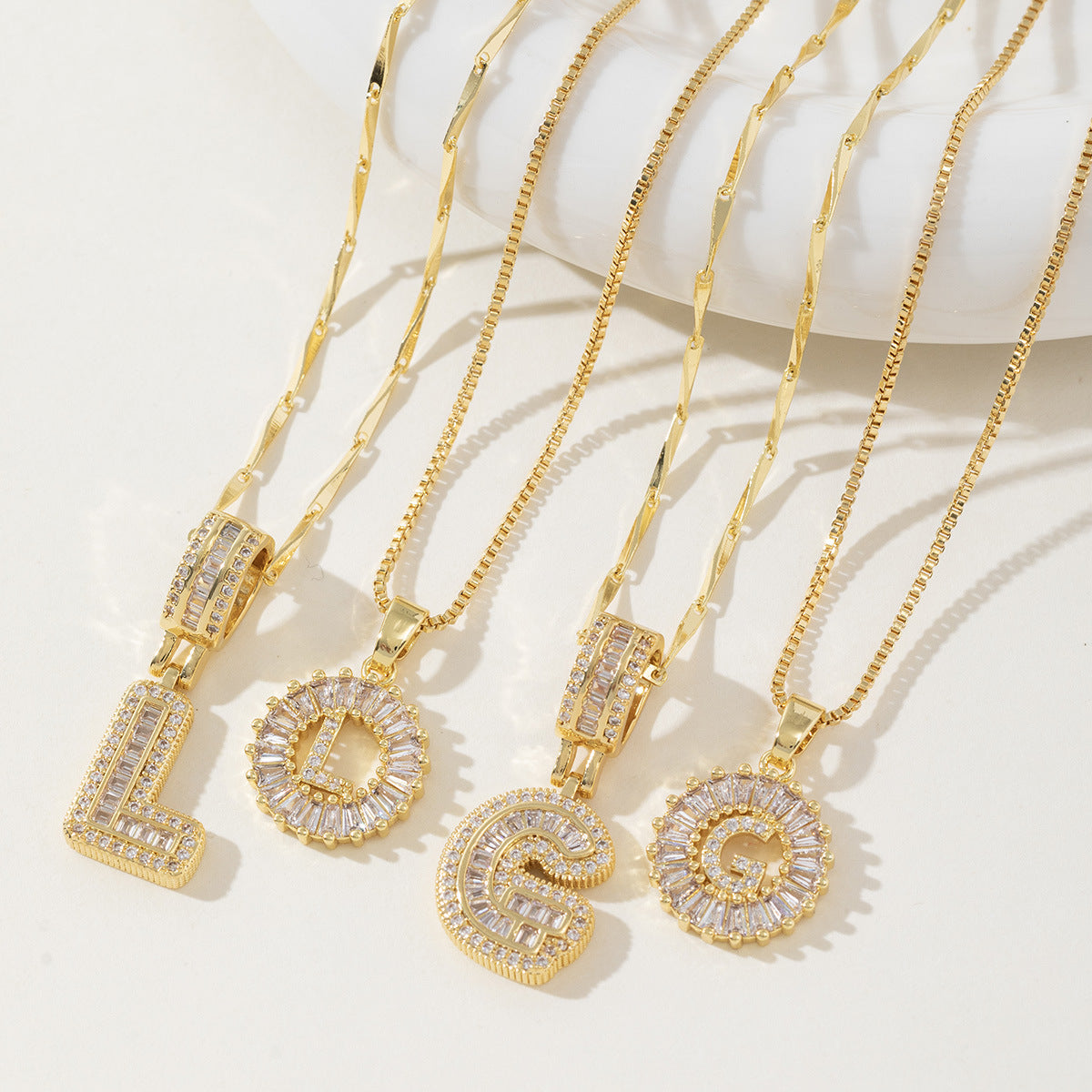 Rock Sugar Copper Inlaid Zircon Letter Pendant