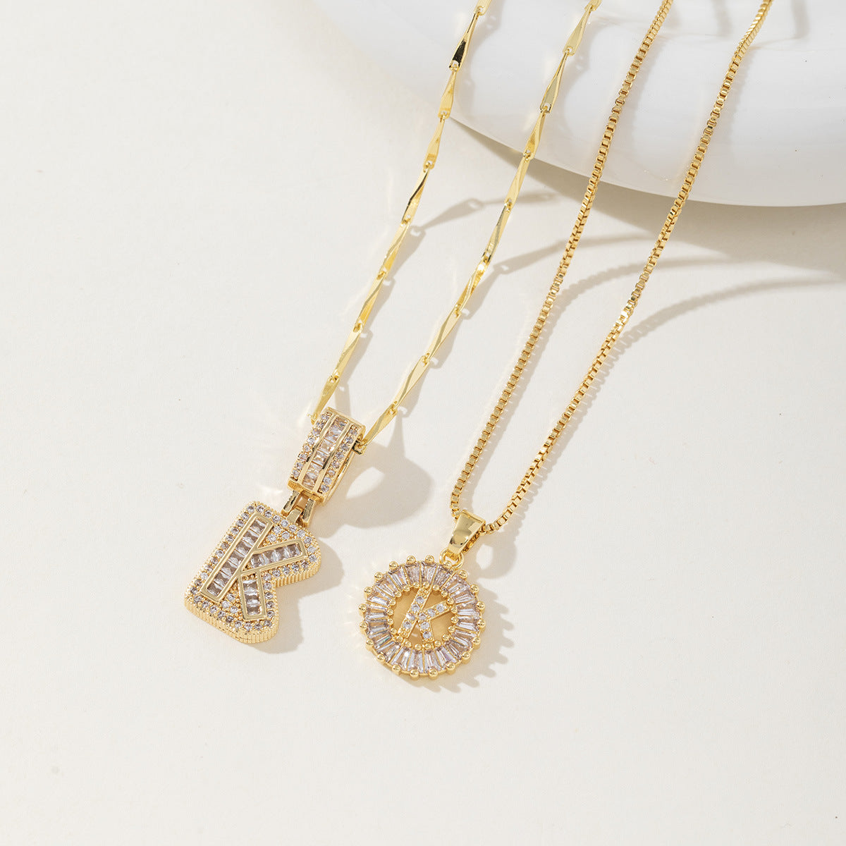 Rock Sugar Copper Inlaid Zircon Letter Pendant